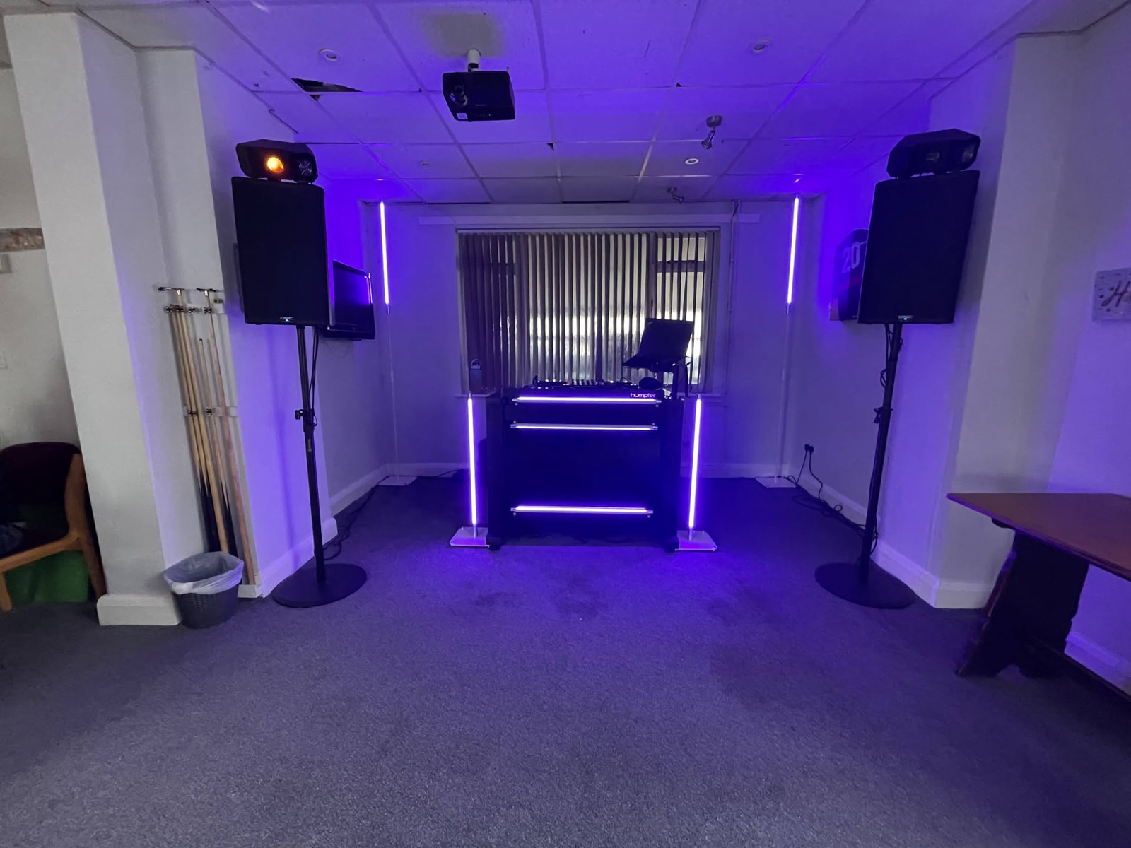Burgh Heath Comrades & Social Club · A black booth and blue column lighting, ready for a milestone birthday