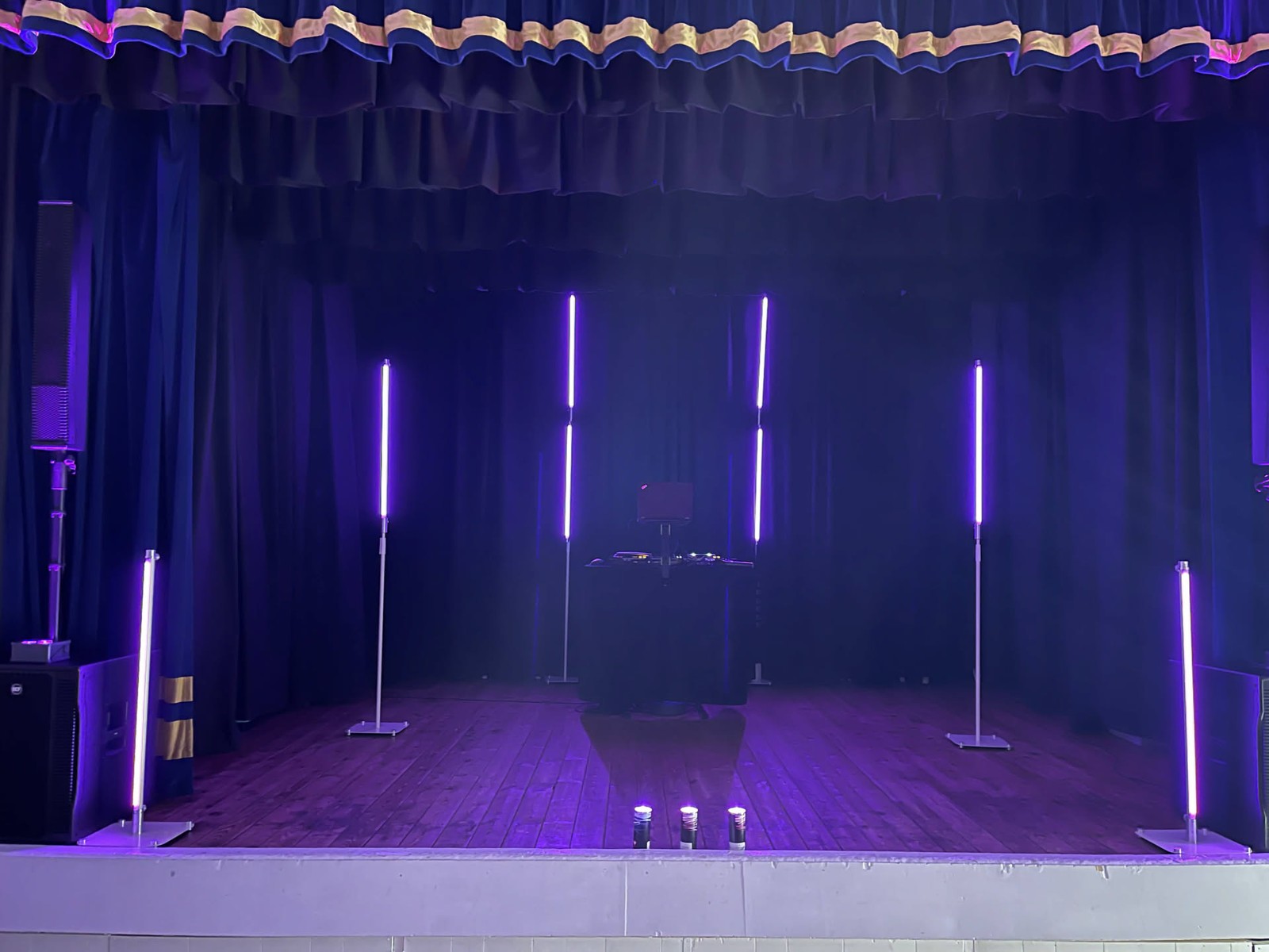 Nork Community Centre · A stage setup and purple column lighting, ready for a birthday party