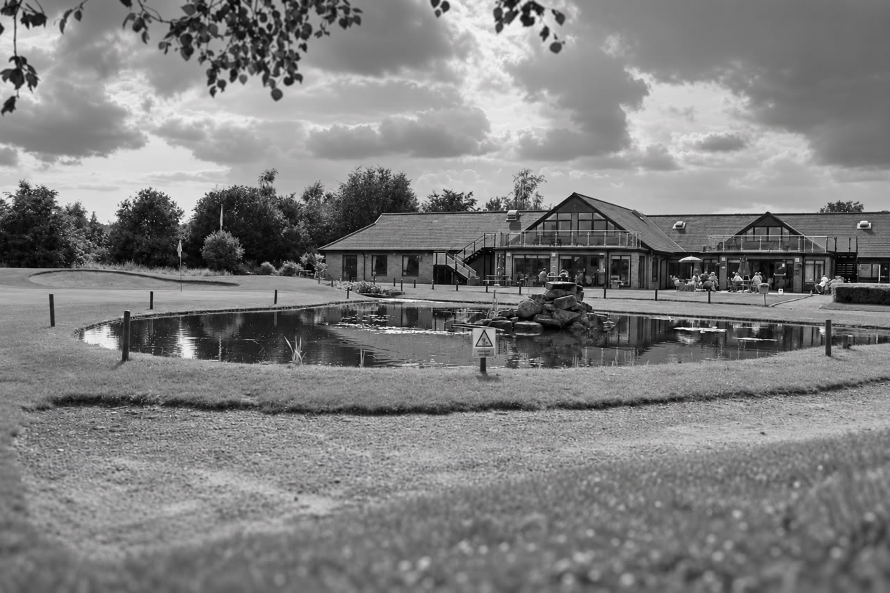 Soft monochrome venue view of Bletchingley Golf Club