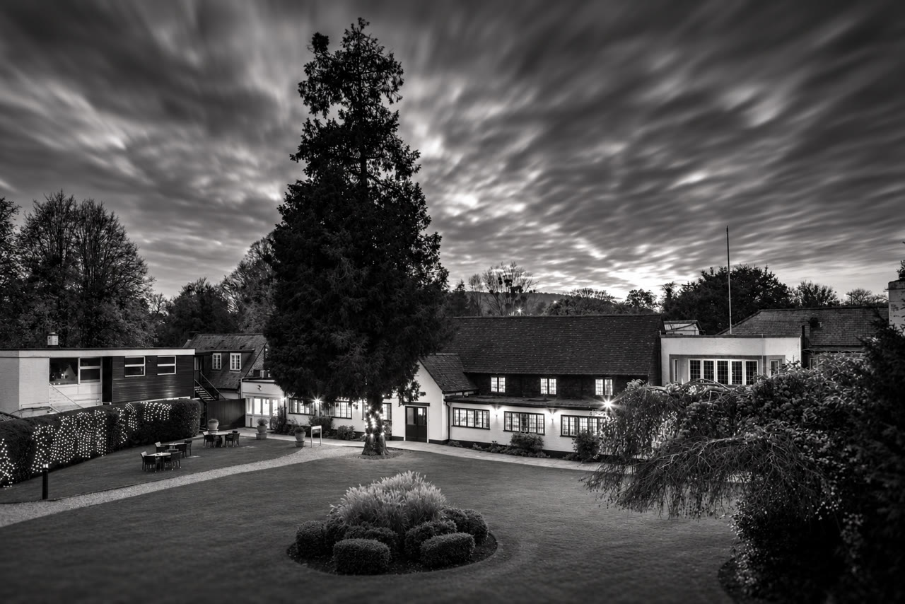 Soft monochrome venue view of Sunday Box Hill Burford Bridge Hotel