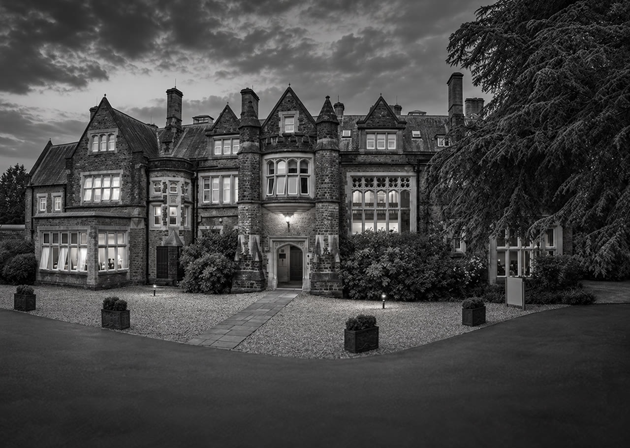 Soft monochrome venue view of Hartsfield Manor