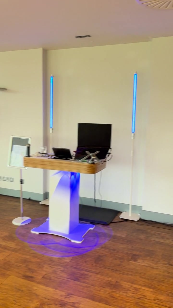 DISCOAGOGO booth, column lighting and uplighters set up in an empty venue room